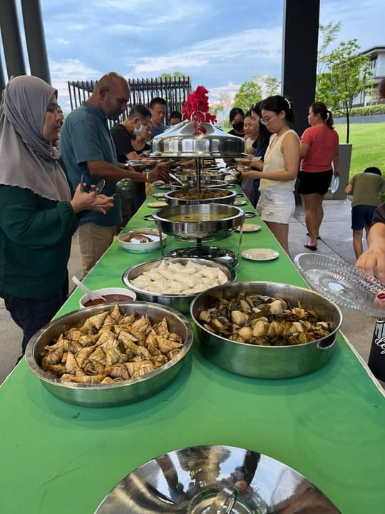 Residents attending a Raya and Deepavali community dinner at Grandezza
